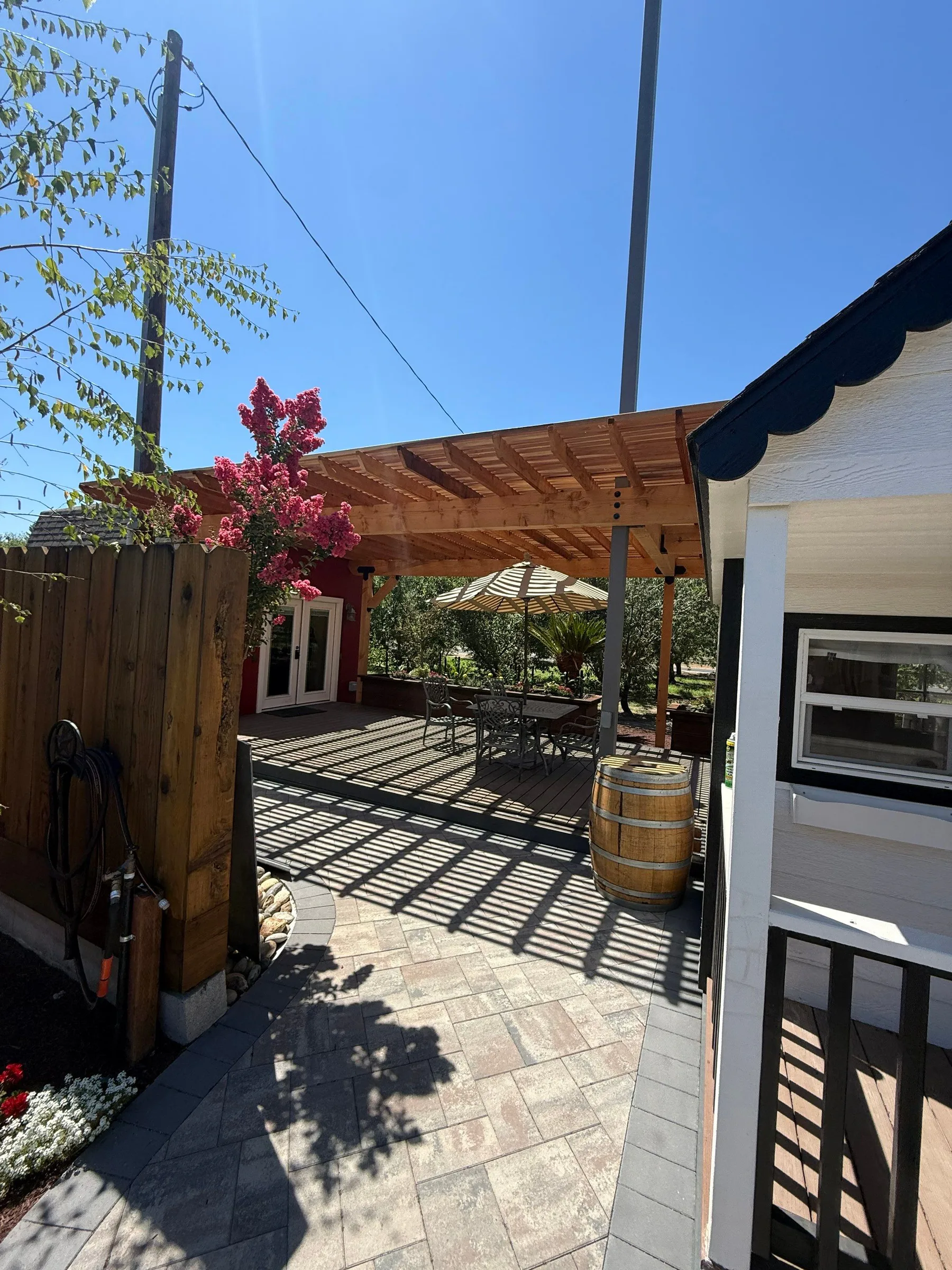 Wood pergola over a Haven Outdoors paver patio